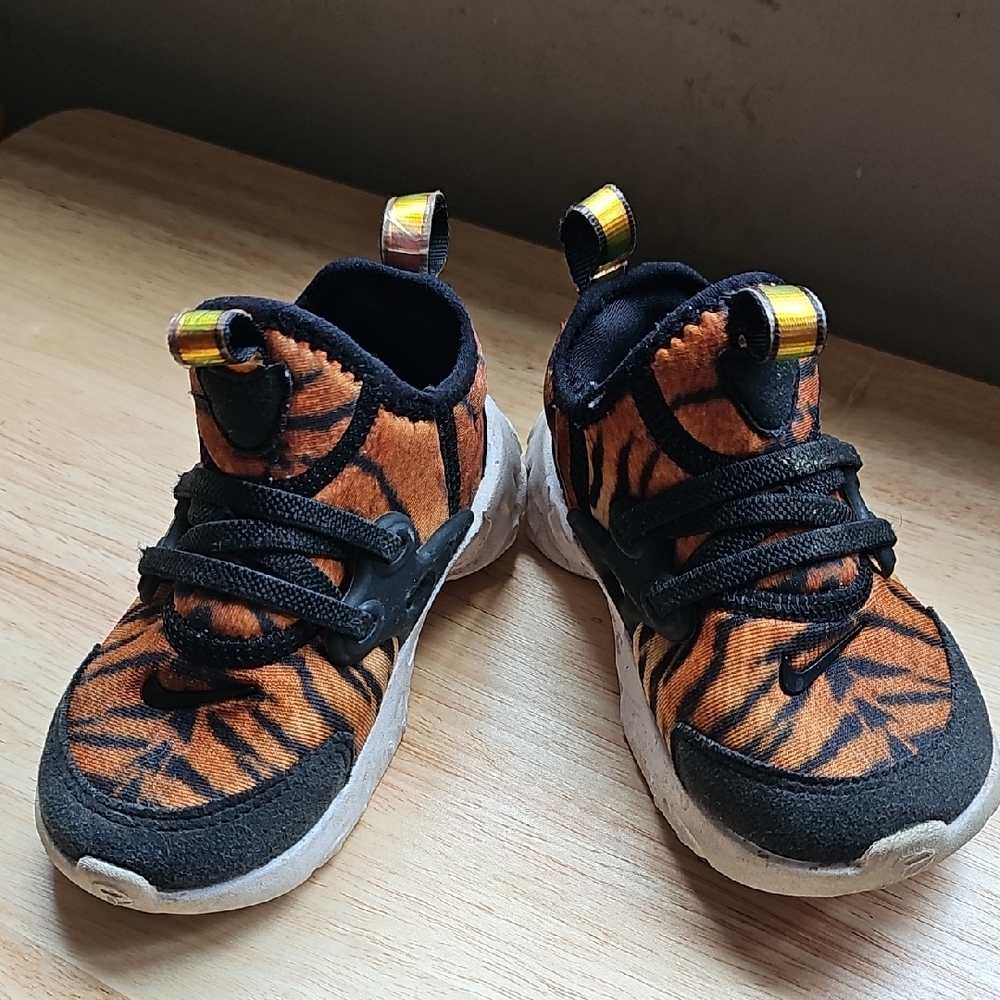 Nike Orange and Black Sneakers with Dynamic Design